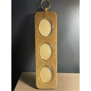 Vtg.Triple oval wall hanging picture frame with velvet front and gold-tone trim.